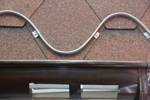 Close up view of heated cable on roof